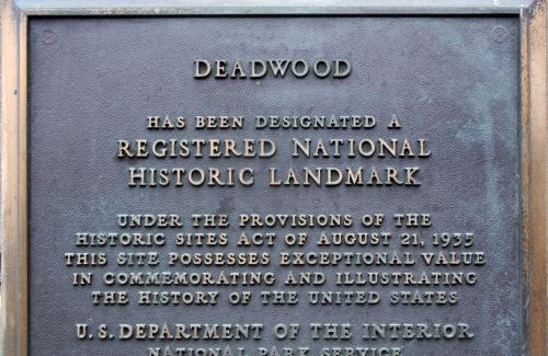 National Historic Landmark Plaque on the front of the Adams Museum (54 Sherman Street)